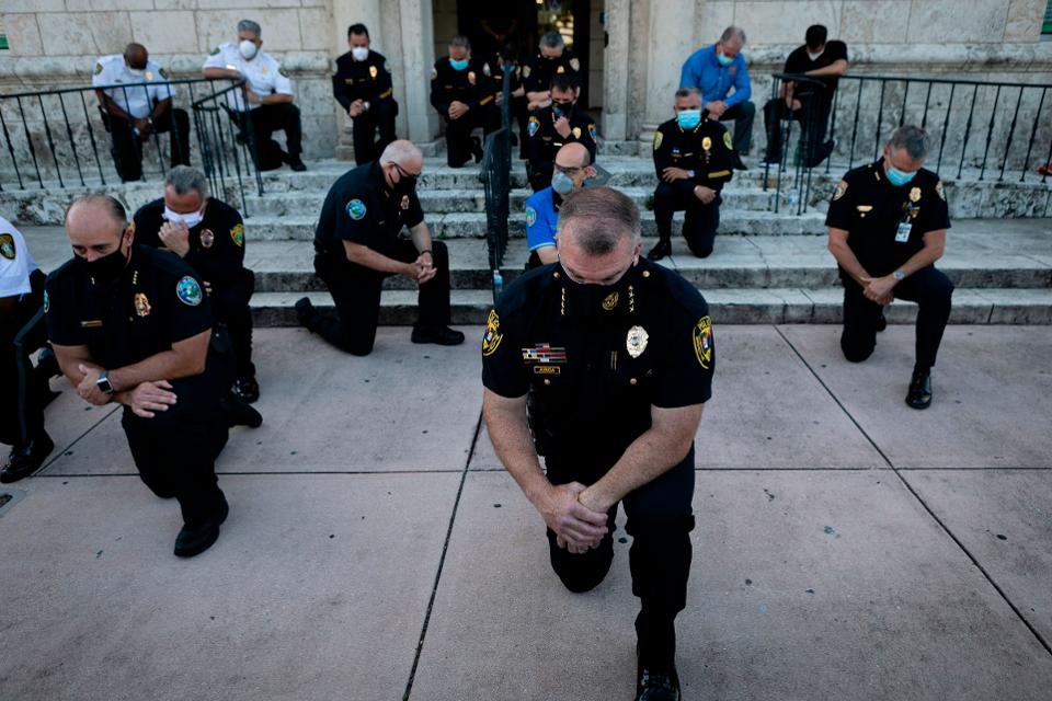Coral Gables PD taking a knee